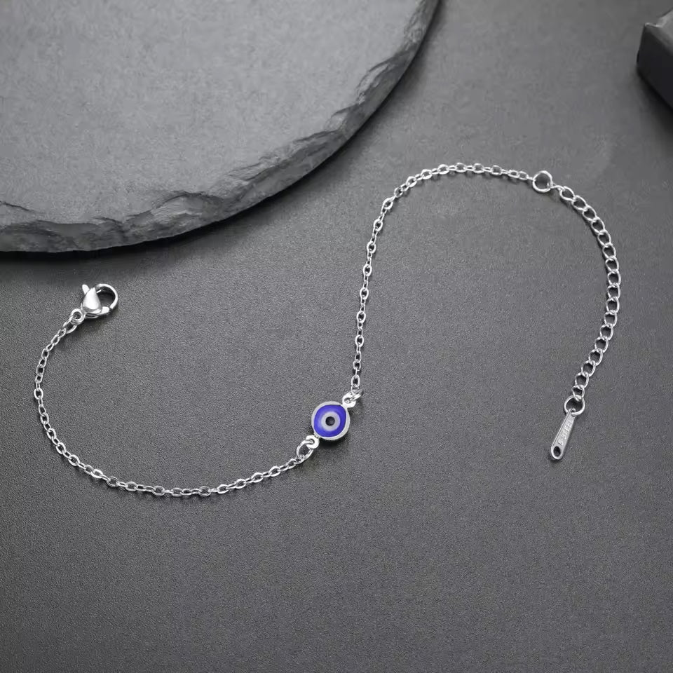 Classic evil eye bracelet with blue glass charm on gold chain
