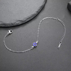 Classic evil eye bracelet with blue glass charm on gold chain