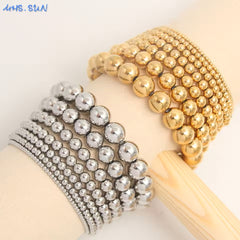 Minimalist gold bead bracelet with elastic fit – women’s fashion accessory