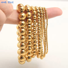 Shiny gold plated bead bracelet with stretch design for easy wear