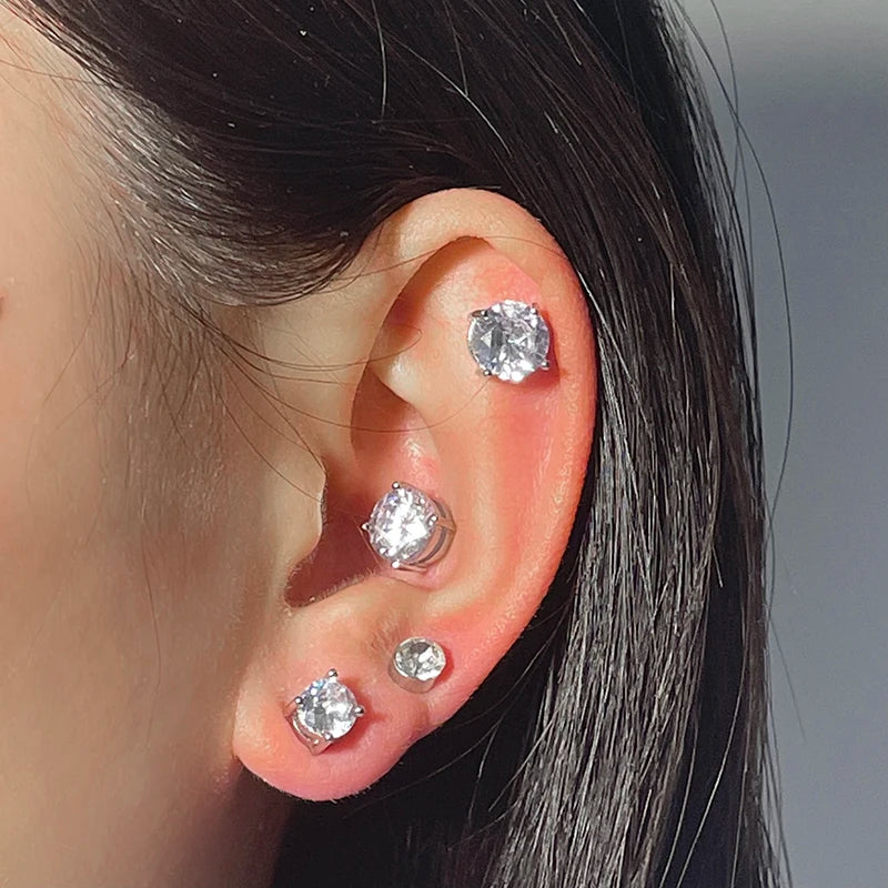 Crystal stud earrings with magnetic backs shown on ear 